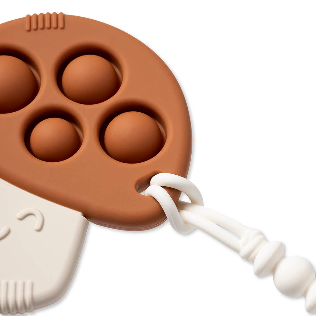 Itzy Pop™ Silicone Teether With Sensory Popper - Dino