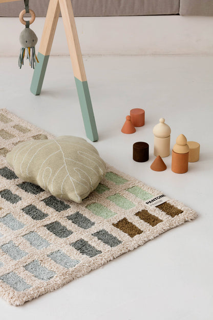 Knitted cushion Baby Leaf Olive: 100% cotton 
Filler: 100% polyester / 11" x 1' 4"