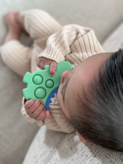 Itzy Pop™ Silicone Teether With Sensory Popper - Dino