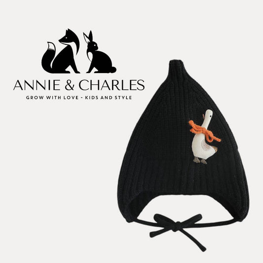 Annie & Charles® Knitted Hat "Winter Goose": Schwarz/Beige