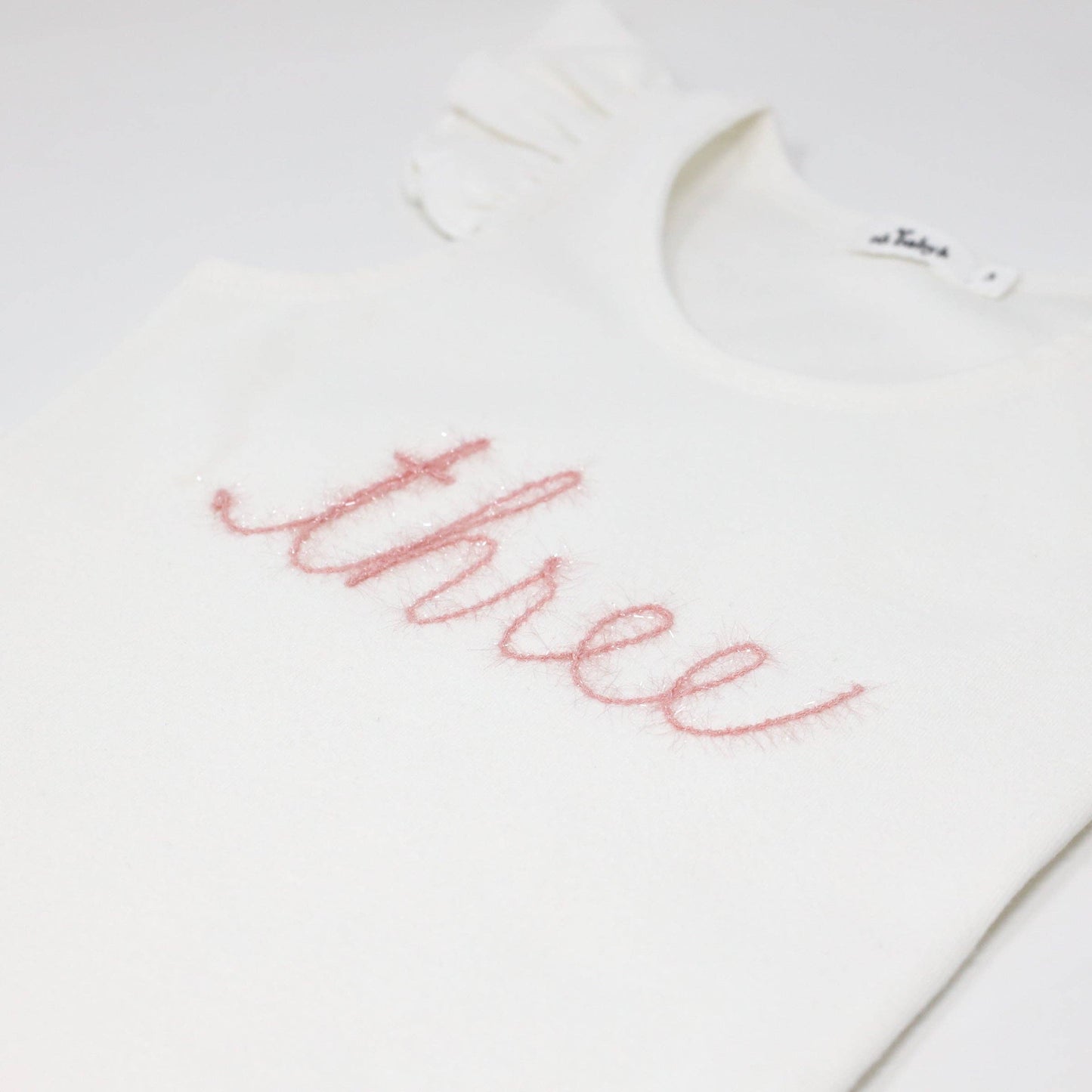 "Three" Pink Sparkle Embr Cotton Baby Rib FS Tank: Cream / 3
